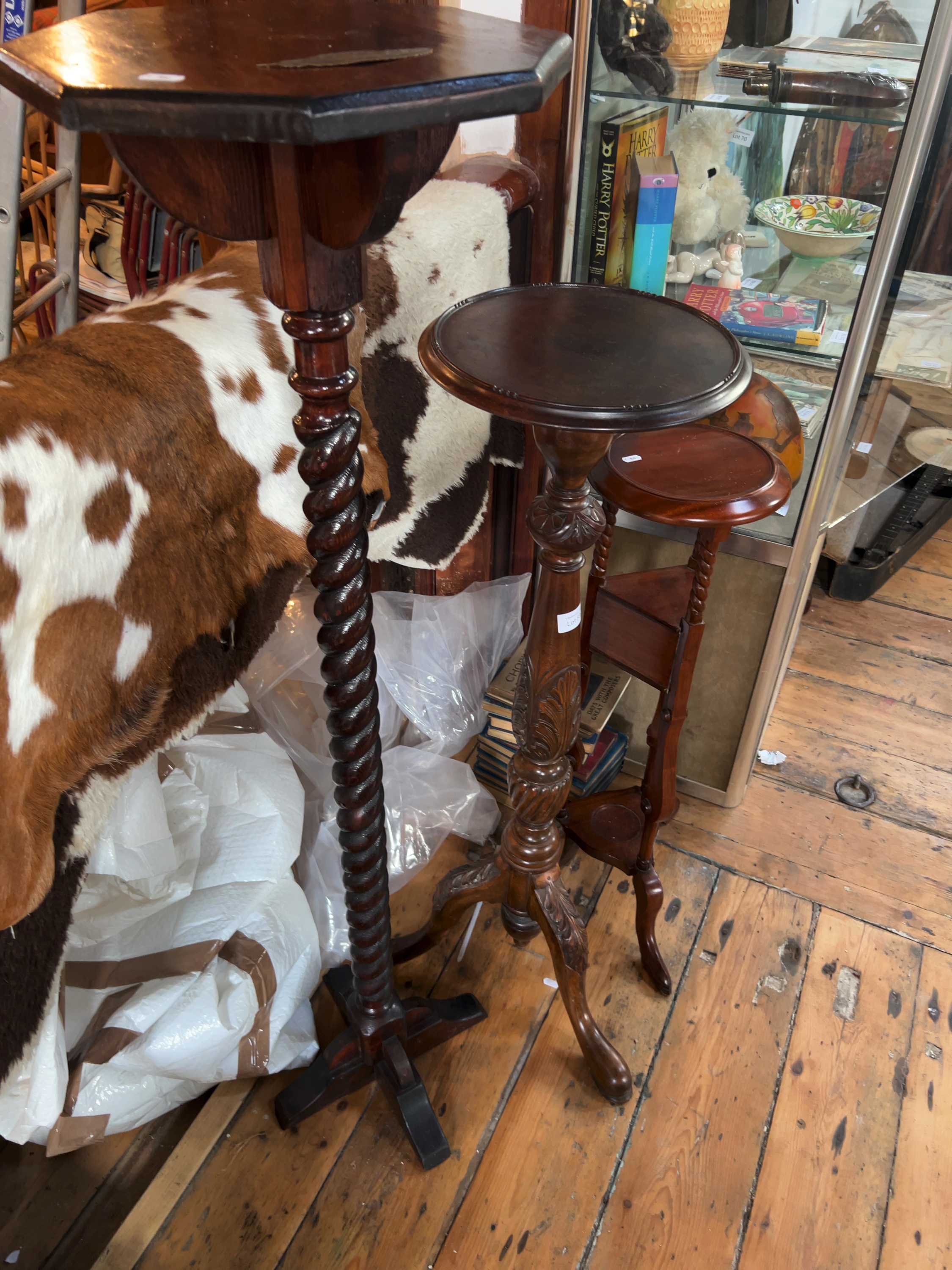 Three Late 19th and Early 20th-Century Mahogany and Stained Wood Pedestal Plant Stands