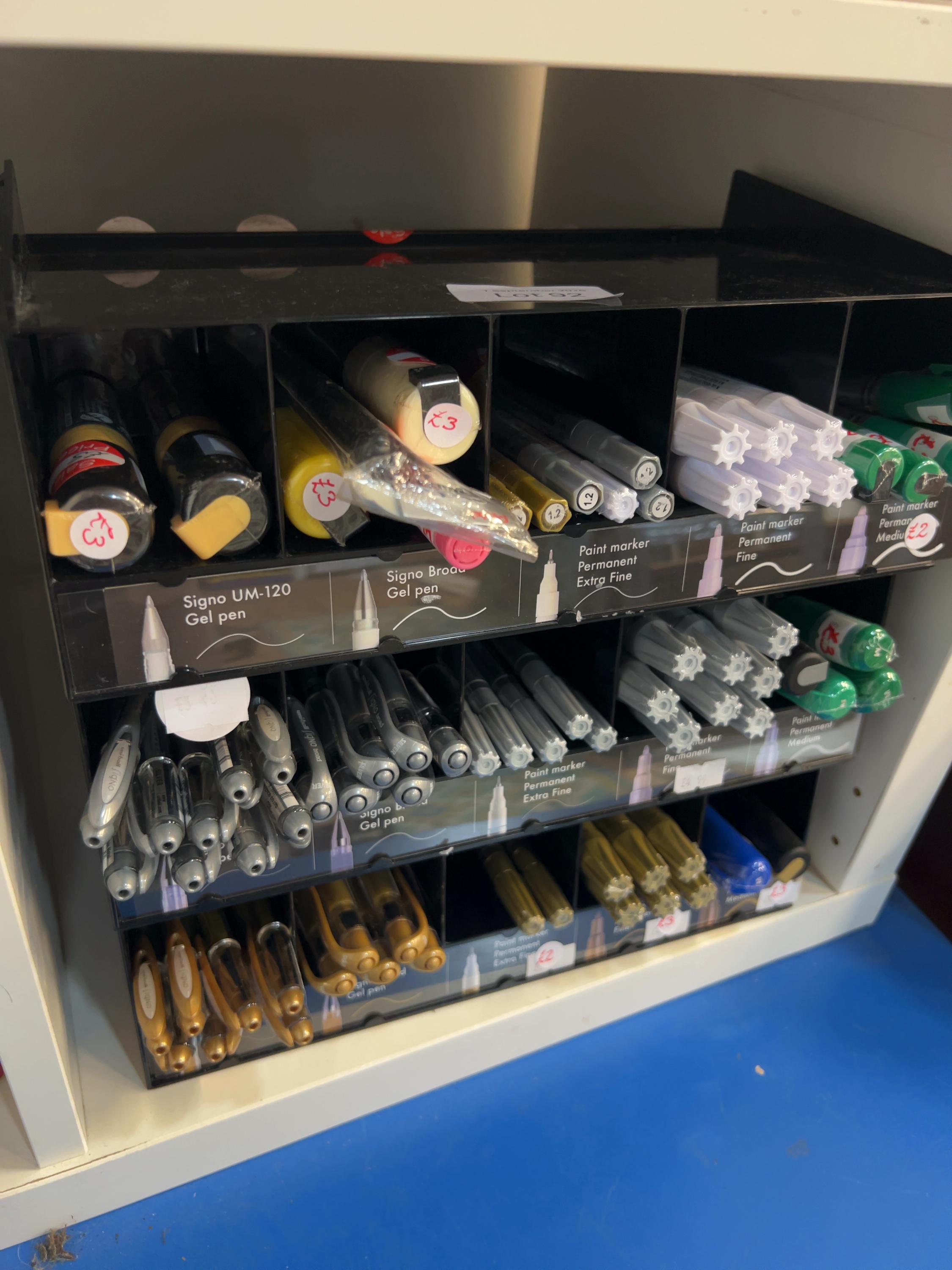 Uni-ball Signo Gel Pens and Paint Markers in Retail Display Stand