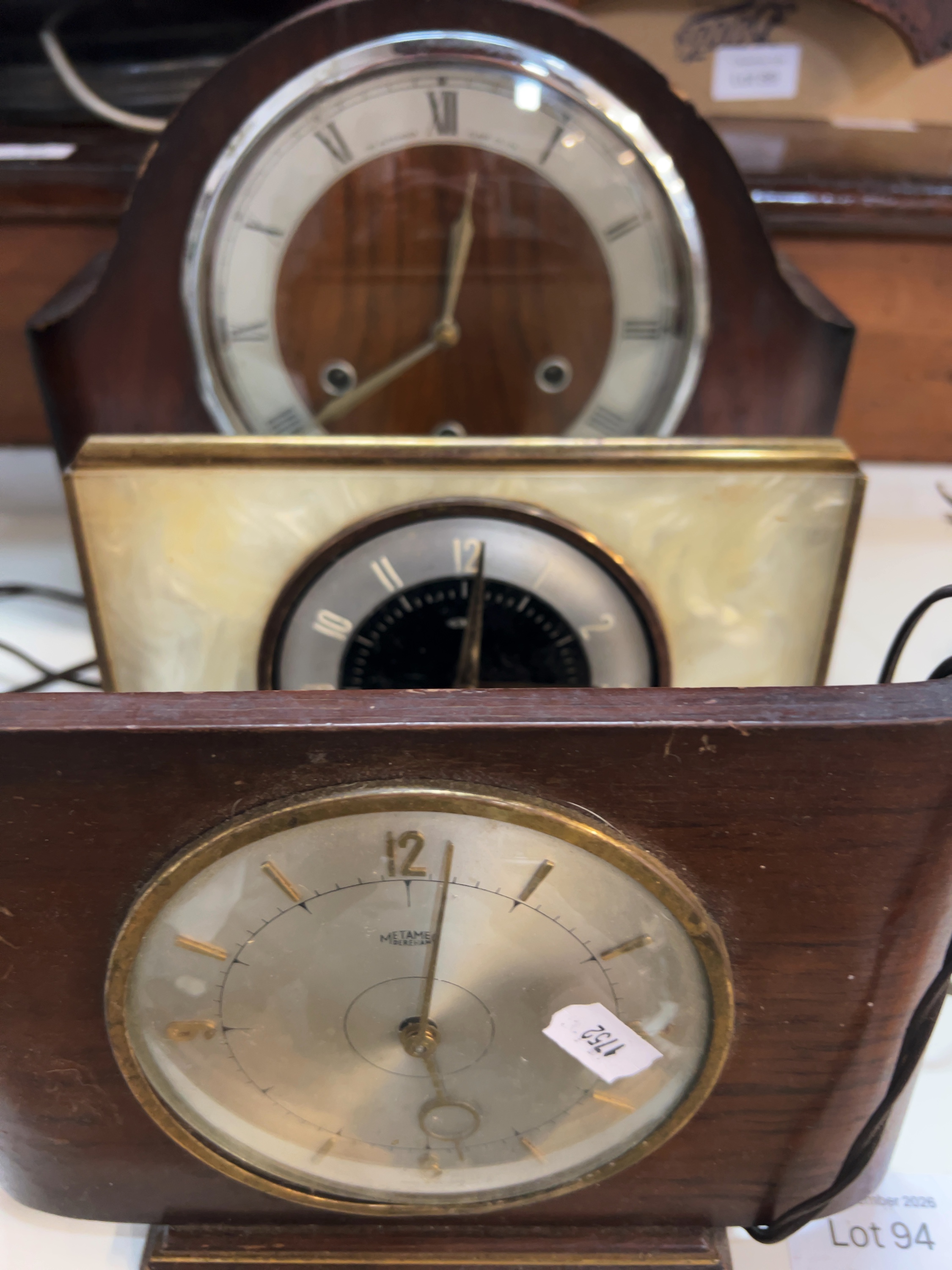 Three Mid-Century Wood and Pearloid Mantel Clocks Including Alexander Clark and Metamec Examples