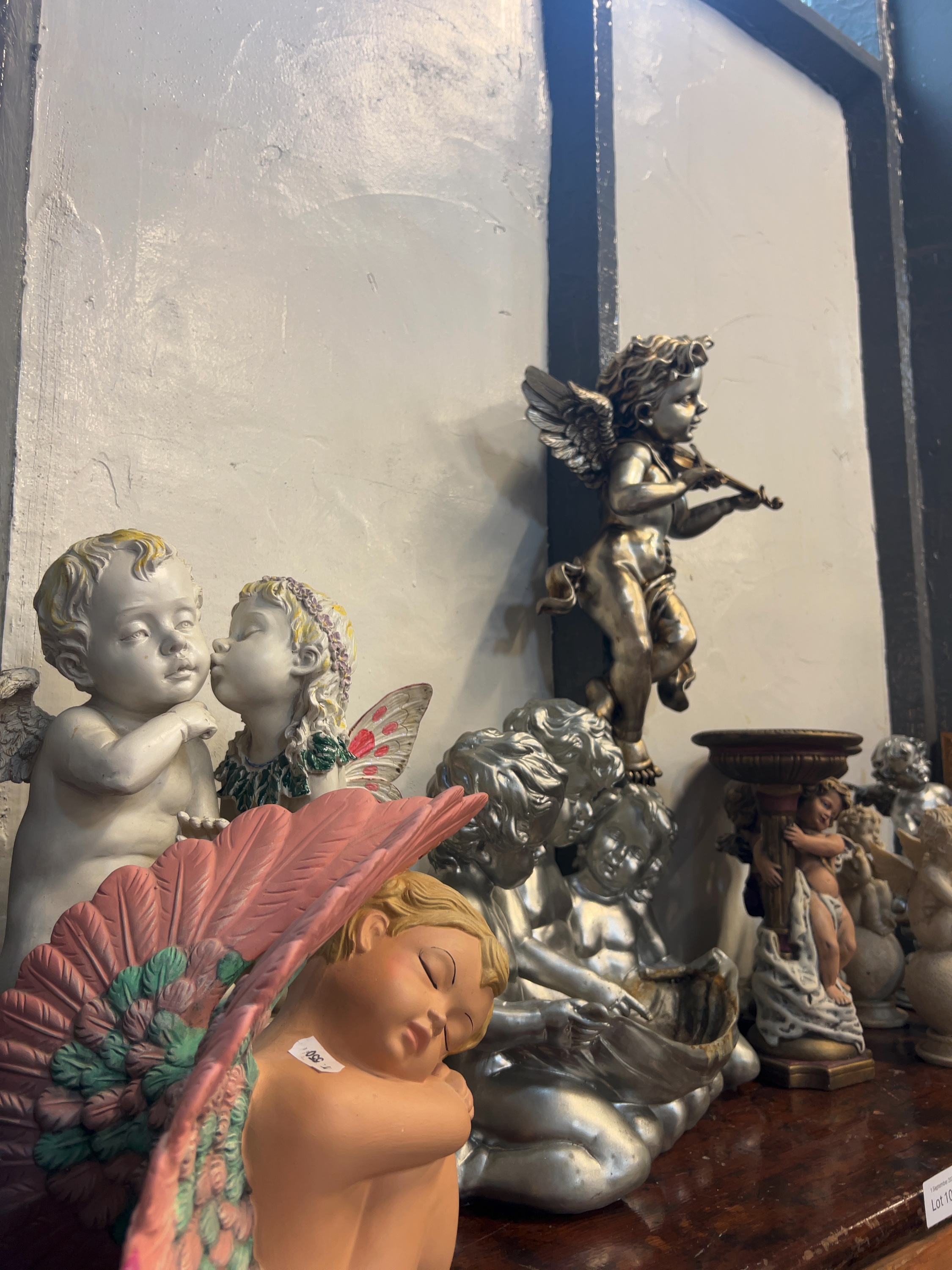 Twelve Baroque-Style Resin Ceramic and Bisque Cherub Figurines