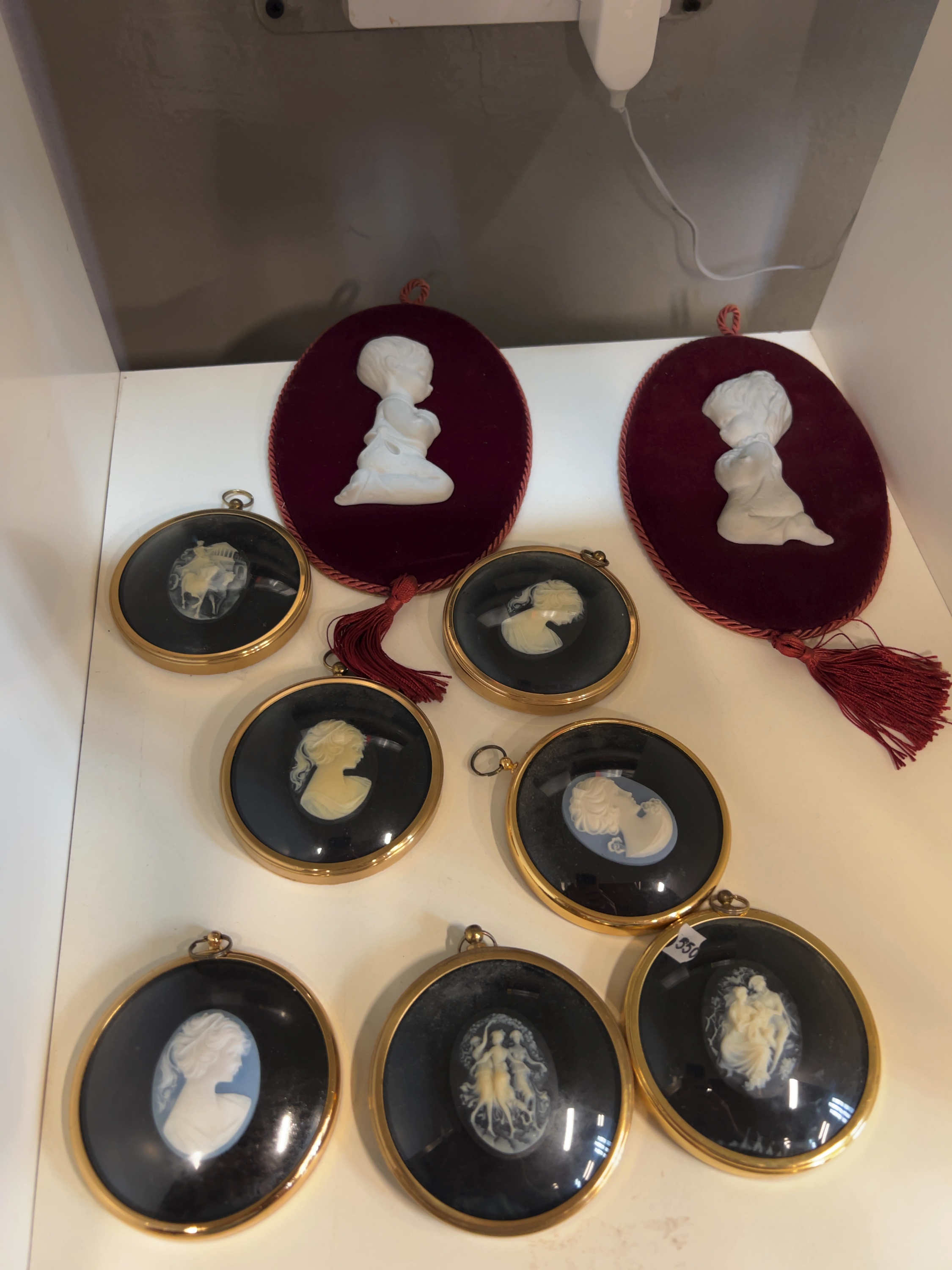 Nine Late 20th-century Peter Bates English Miniature Cameo and Bas-relief Wall Plaques