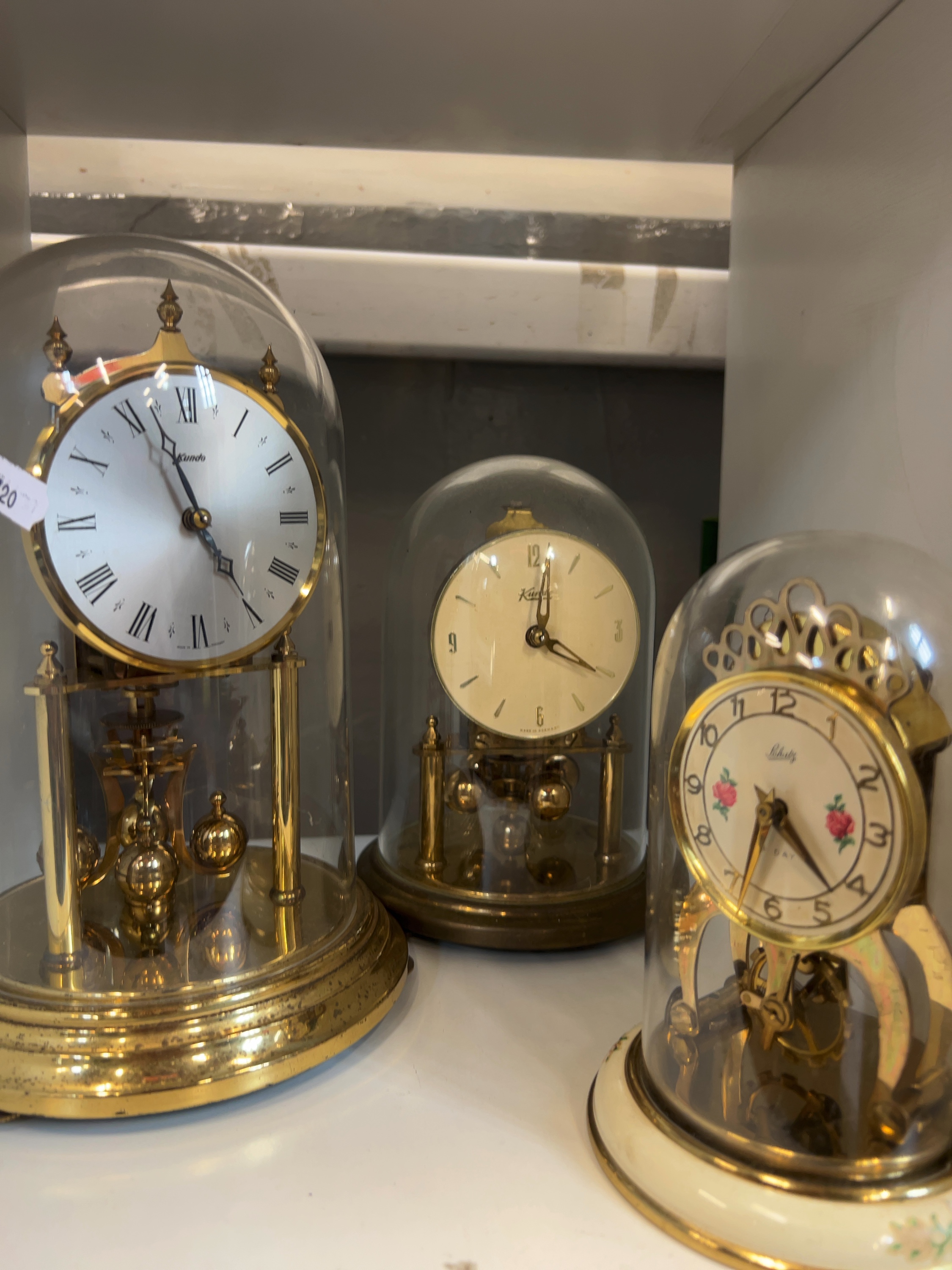 Three Mid-20th Century Kundo and Schatz Brass and Ceramic Anniversary Clocks