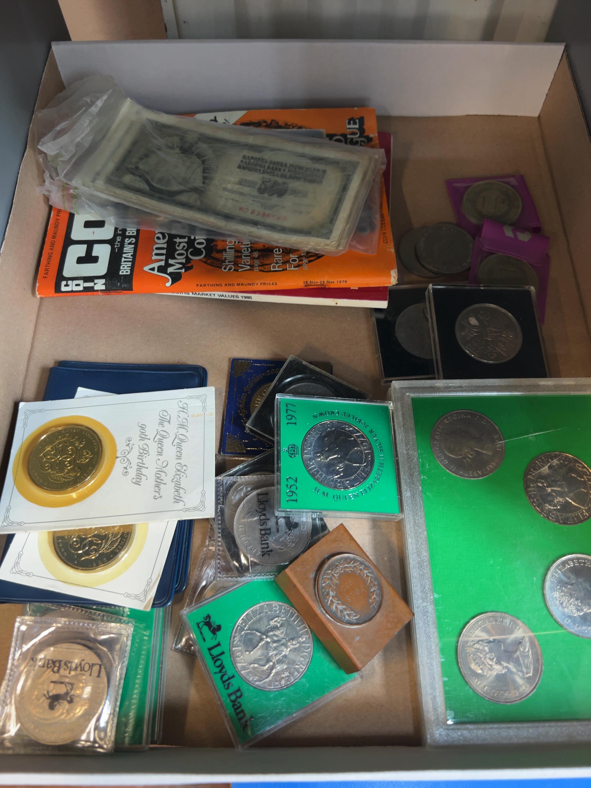British Commemorative Crowns and International Banknotes including Yugoslavian Dinara and Lloyds Bank Medallions