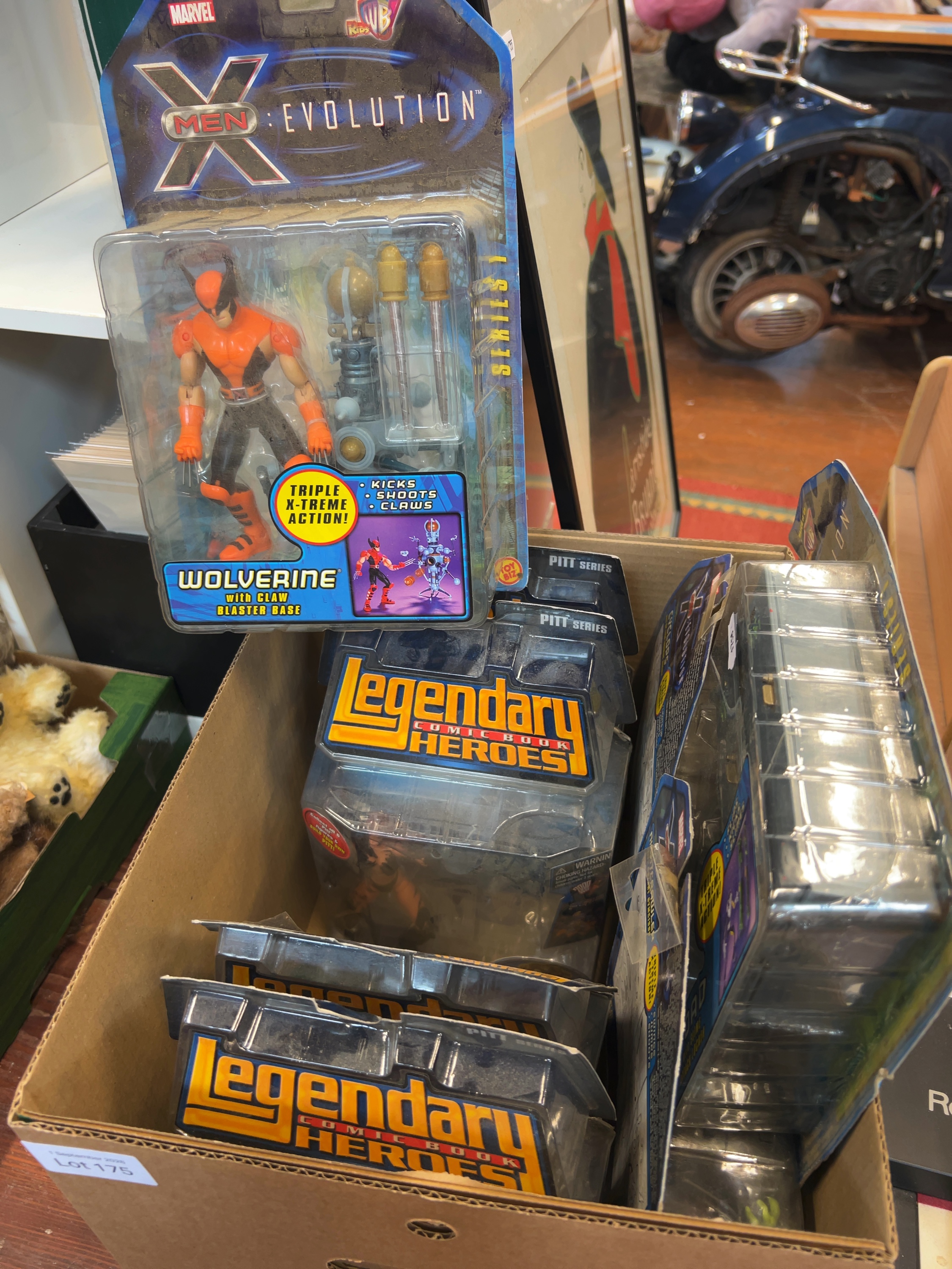 Early 2000s Toy Biz Carded Action Figures including X-Men Evolution and Legendary Comic Book Heroes
