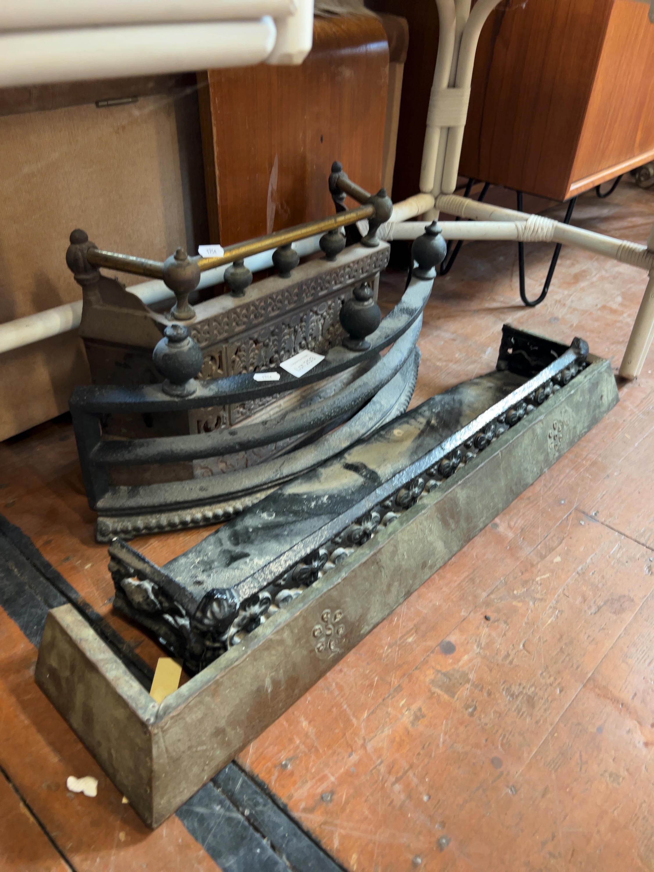 Four Victorian Cast Iron and Brass Fireplace Accessories Including a Fire Grate and Fenders