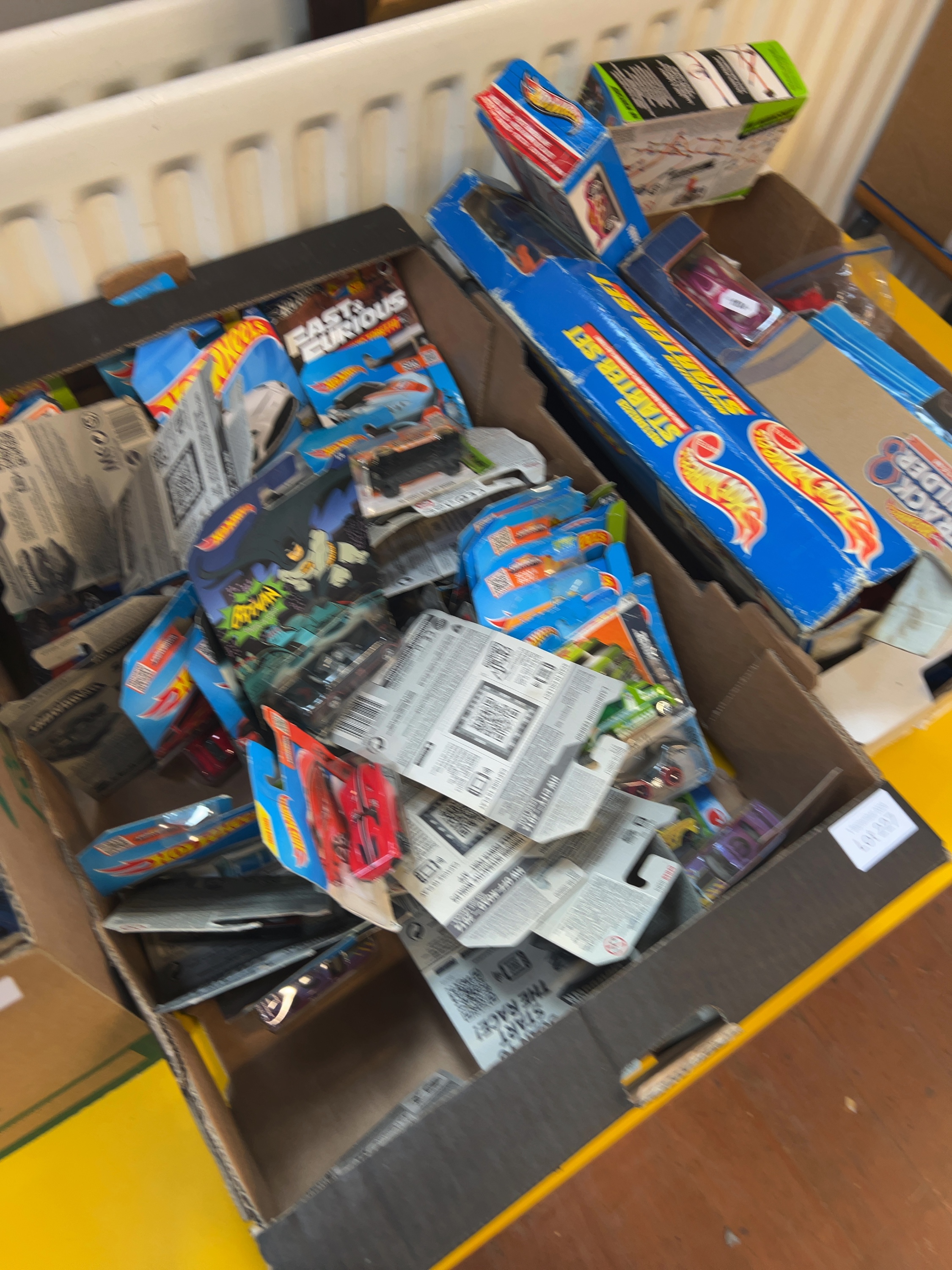 Multiple Hot Wheels, Matchbox, and Majorette Toy Vehicles and Track Sets including Batman and Fast & Furious Series
