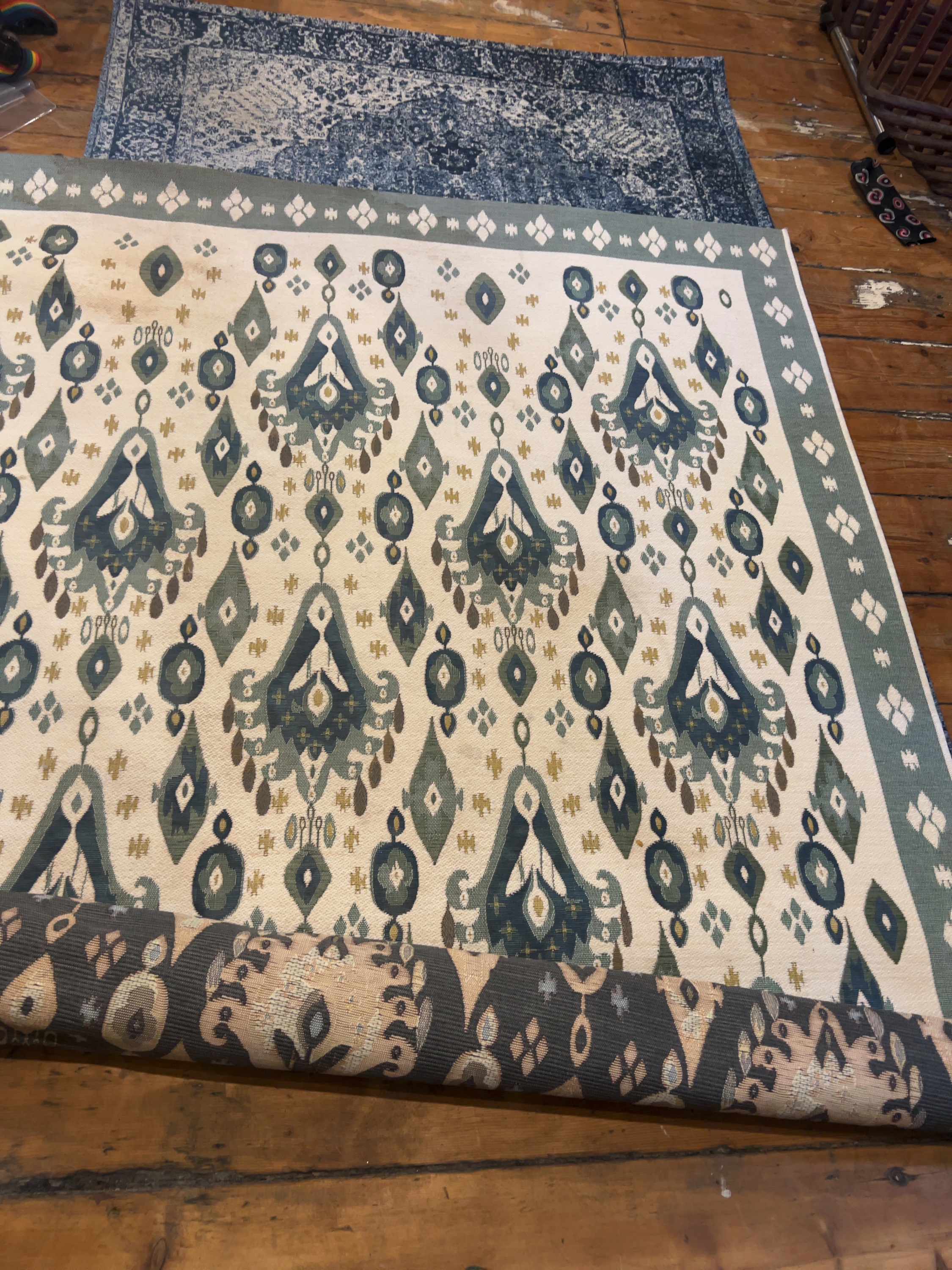 Two Contemporary Machine-Woven Rugs Including Ikat Style and Distressed Medallion Examples