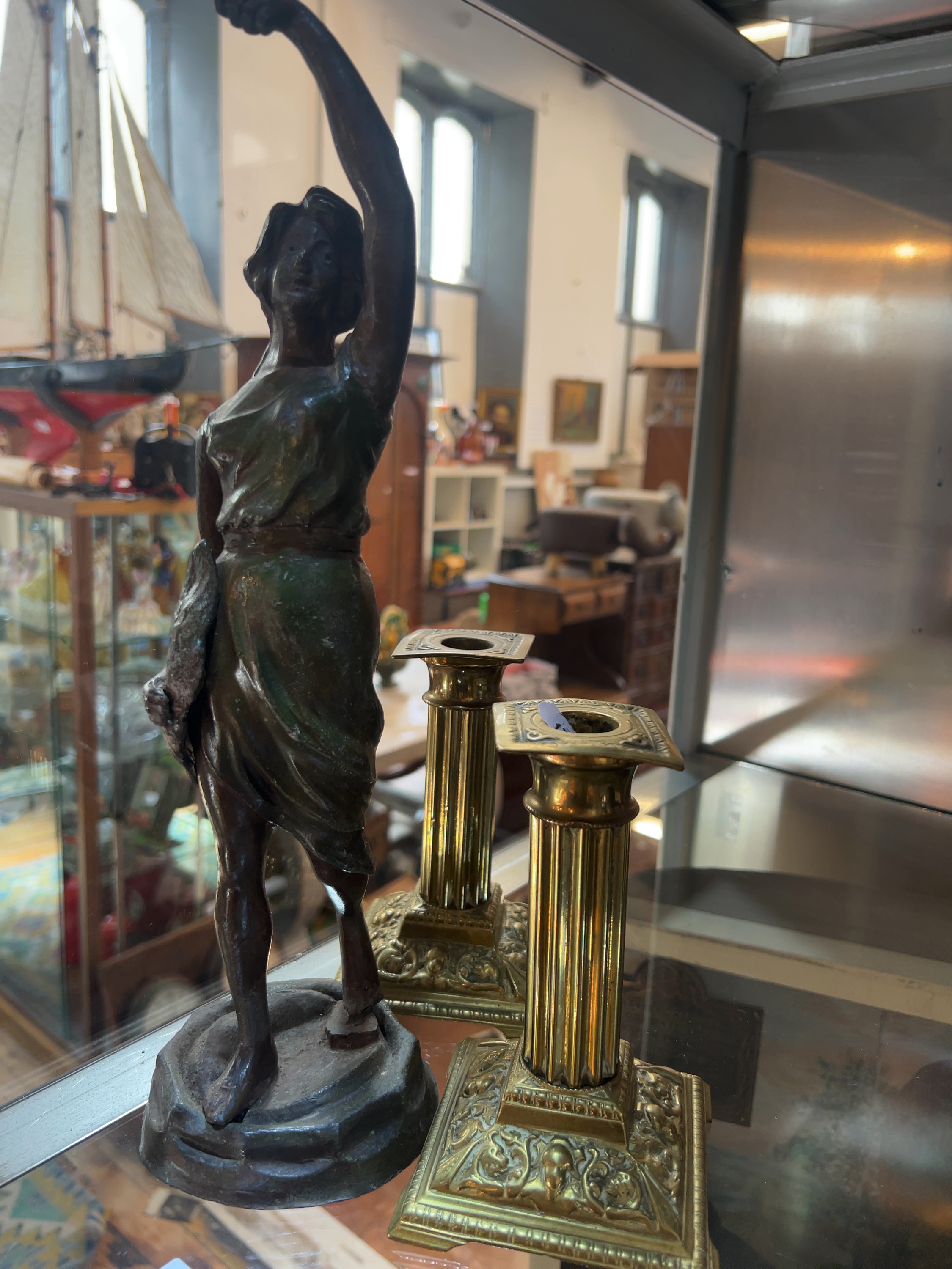 Three Late 19th Century-style Items Inc, a Patinated Metal Sculpture and Two Brass Candlesticks