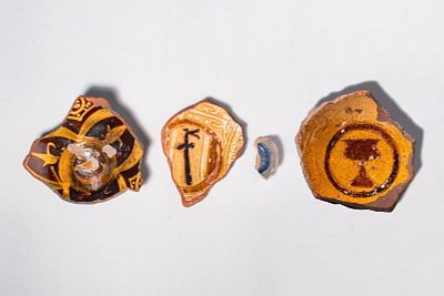 A GROUP OF MAMLUK POTTERY FRAGMENTS. Egypt, Ca. AD 1300 - 1500. A collection of three pottery 