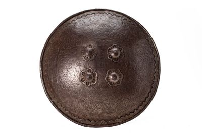 A LARGE ENGRAVED INDO-PERSIAN STEEL SHIELD (DHAL). Northern India or Iran, Ca. 18th -19th 