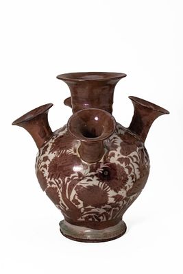 A SAFAVID FLOWER VASE. Safavid Iran, Ca. 18th century AD . A flower vase of elegant baluster 
