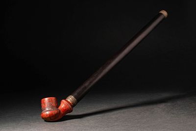 A FINELY CARVED OTTOMAN OPIUM SMOKING PIPE. Ottoman, Turkey, Ca. 19th century AD . An opium 