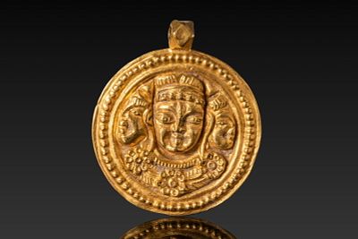 PALA-SENA HIGH KARAT GOLD MEDALLION OF DURGA. Ca. AD 800 - 1100. A repouss&eacute; 22.5 kt gold 