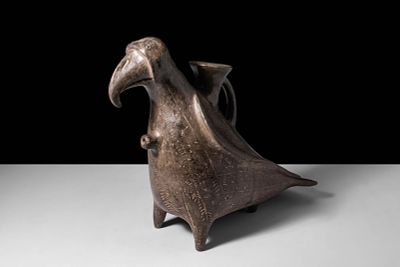 ANCIENT NEAR EASTERN TERRACOTTA BIRD-SHAPED RHYTON. Ca. 1st millennium BC. A terracotta rhyton 