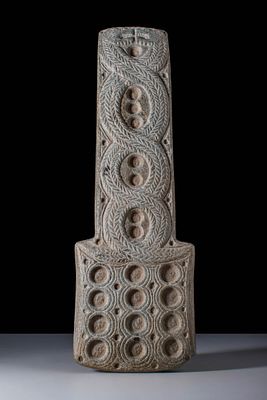 BACTRIAN SCHIST PALETTE WITH COILED DRAGONS. Ca. 2500 BC. A schist palette tapering towards the 