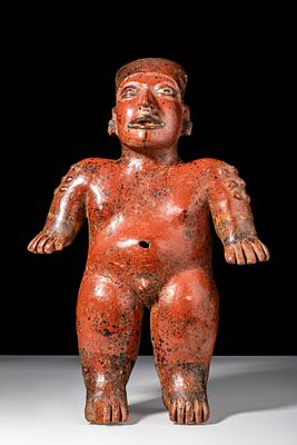 JALISCO STANDING MALE WITH NODED SHOULDERS. Ca. 100 BC - 250 AD. A red-brown slip pottery 