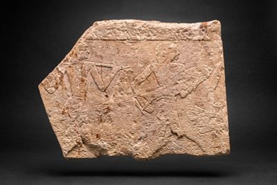 EGYPTIAN SANDSTONE RELIEF DEPICTING WORSHIPPERS. Old Kingdom to New Kingdom, Ca. 2400 - 1200 BC. 