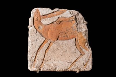 EGYPTIAN LIMESTONE TALATAT BLOCK WITH SUNK RELIEF SCENE OF ANTELOPE CAPTURE. New Kingdom, Ca. 