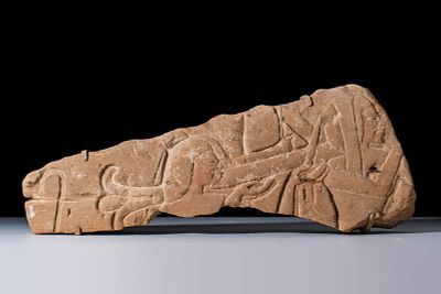 EGYPTIAN SANDSTONE RELIEF FRAGMENT WITH OFFERING SCENE. New Kingdom, Ca. 1550 - 1069 BC. A 