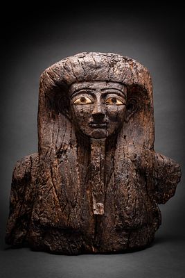 LARGE EGYPTIAN WOODEN SARCOPHAGUS MASK. Late Period, Ca. 664 - 332 BC. A broad carved wooden 