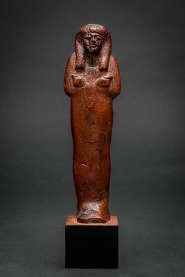 SUPERB EGYPTIAN WOODEN USHABTI. New Kingdom, Ca. 1550 - 1069 BC. A wooden ushabti figure of 