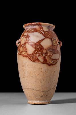 EGYPTIAN BRECCIA STONE VESSEL. Old Kingdom, Ca. 2900 - 2240 BC. A vessel carved from breccia 