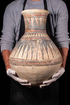 EGYPTIAN PAINTED POTTERY JAR WITH NILOTIC PLANTS. Amarna Period, Ca. 1353 - 1336 BC. A large 