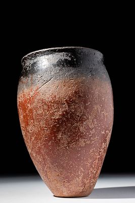 EGYPTIAN BLACK-TOPPED POTTERY JAR. Predynastic Period, Ca. 4000 - 3000 BC. A black-topped 