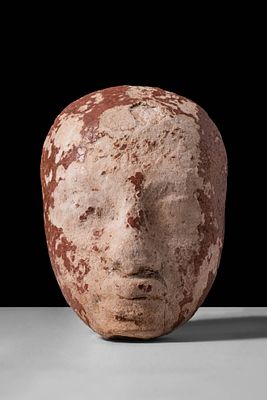 EGYPTIAN HEAD OF AMARNA PRINCESS. Amarna Period, Ca. 1353 - 1336 BC. A sculpted head depicting a 
