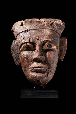 EGYPTIAN WOODEN MASK. Third Intermediate Period, Ca. 1069 - 664 BC. A carved wooden mask 