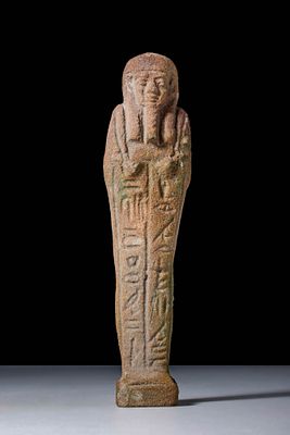 EGYPTIAN FAIENCE USHABTHI WITH INSCRIPTION. Late Period, Ca. 664 - 30 BC. A faience mummiform 