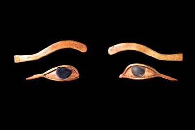 MATCHED PAIR OF EGYPTIAN HIGH KARAT GOLD AND STONE-INLAID EYES FROM A MUMMY MASK. New Kingdom 