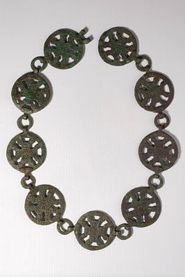 BYZANTINE BRONZE BELT WITH CROSSES. Ca. AD 900 - 1000. A bronze belt composed of nine 