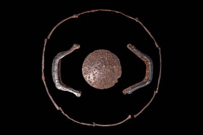 RARE VIKING IRON SHIELD. Ca. AD 800 - 901. An iron shield comprising a domed boss, a pair of 
