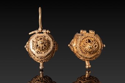 PAIR OF VIKING AGE OPENWORK HIGH KARAT GOLD EARRINGS. Ca. AD 700 - 900. A matched pair of 