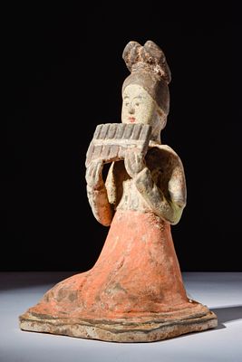 CHINESE TERRACOTTA SEATED MUSICIAN - TL TESTED. Tang Dynasty, Ca. AD 618 - 907. A terracotta 