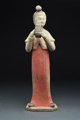 CHINESE TERRACOTTA FEMALE MUSICIAN - TL TESTED. Tang Dynasty, Ca. AD 618 - 907. A terracotta 
