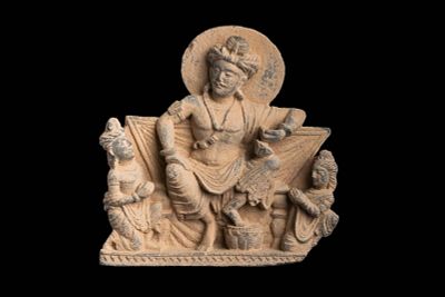 GANDHARAN RELIEF PANEL OF BUDDHA. Kushan Period, Ca. AD 200 - 300. A finely carved terracotta 