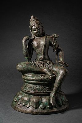 JAVA BRONZE FIGURE OF GREEN TARA. Ca. 11th century AD or later. A bronze figure of Green Tara 