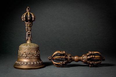 TIBETAN BRONZE DORJE AND DORJE BELL. Ca. 19th - 20th century AD. A ritual bronze dorje (vajra) 