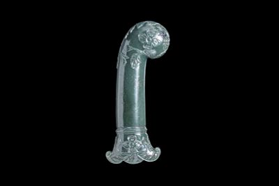 MUGHAL CARVED JADE HILT. North India, Ca. 18th - 19th century AD. A carved green jade dagger 