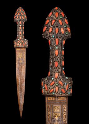 OTTOMAN CORAL AND TURQUOISE INLAID DAGGER. Ca. 18th - 19th century AD. A steel dagger with a 