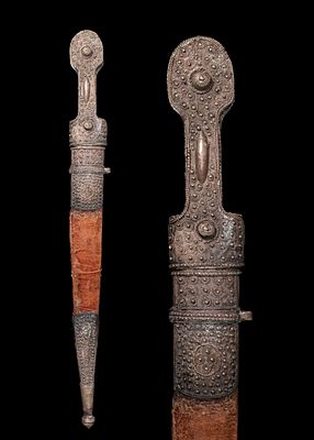 OTTOMAN DAGGER WITH SCABBARD. Ca. 18th - 19th century AD. A dagger with a double-edged blade 