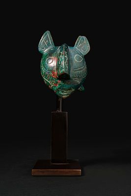 SELJUK BRONZE HEAD OF FELINE. Ca. 12th - 14th century AD. A bronze feline head, modelled with 