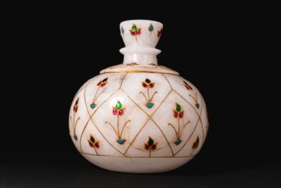 MUGHAL INLAID HUQQA BASE. Ca. 18th - 19th century AD. A gem-set huqqa base with a compressed 