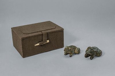 PAIR OF CHINESE BRONZE FROGS. Han Dynasty, Ca. 2nd century BC - 3rd century AD. A pair of bronze 