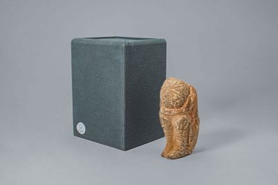 CHINESE PAINTED POTTERY CRYING FIGURE. Northern Wei, Ca. 4th-6th century AD. A pottery crying 