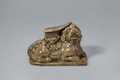 CHINESE YAOZHOU celadon-glazed LION FIGURE. Song/Jin Dynasty, Ca. 10th-13th century AD. A 