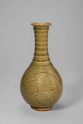 CHINESE YAOZHOU CELADON GLAZE CARVED VASE. Ca. 12th-13th century AD. A Yaozhou celadon carved 
