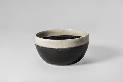 CIZHOU WHITE RIM BLACK GLAZED BOWL. Jin/Yuan Dynasty, Ca. 12th-14th century AD. A ceramic bowl 